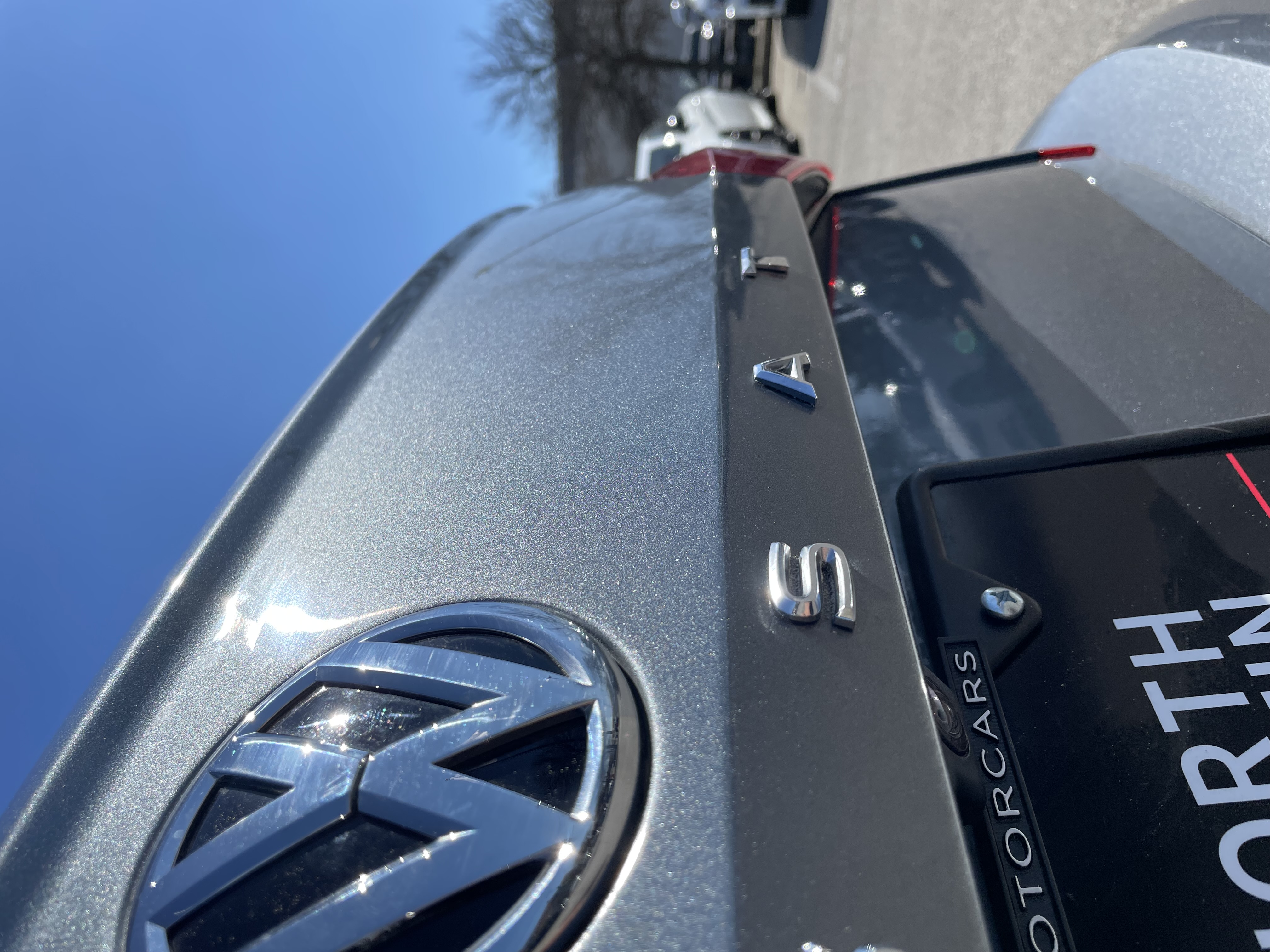 Before PDR — VW Passat rear hatch with dent