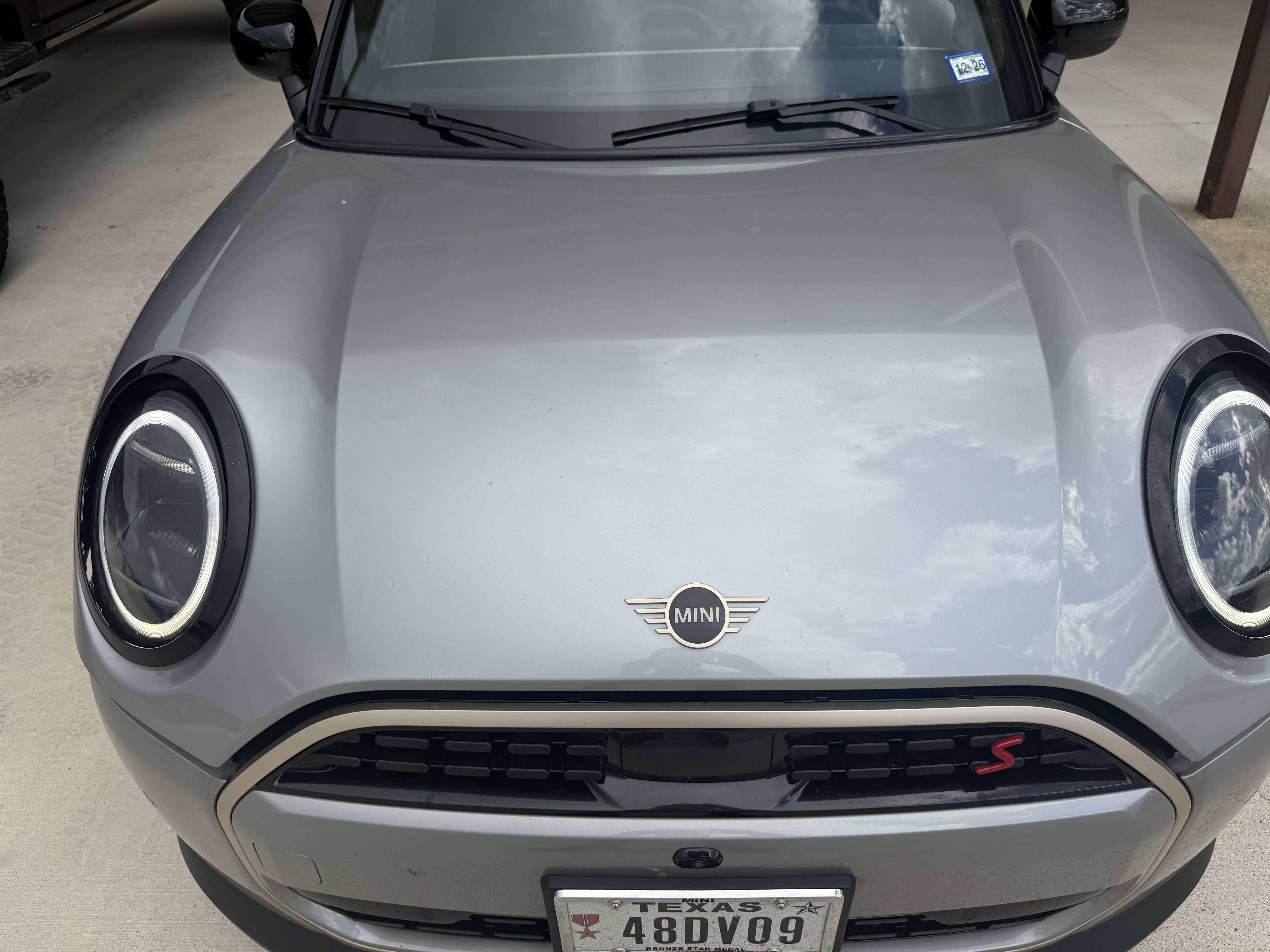 Before PDR repair  MINI Cooper hood with dent